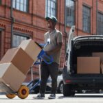 Delivery Worker Unloading Truck