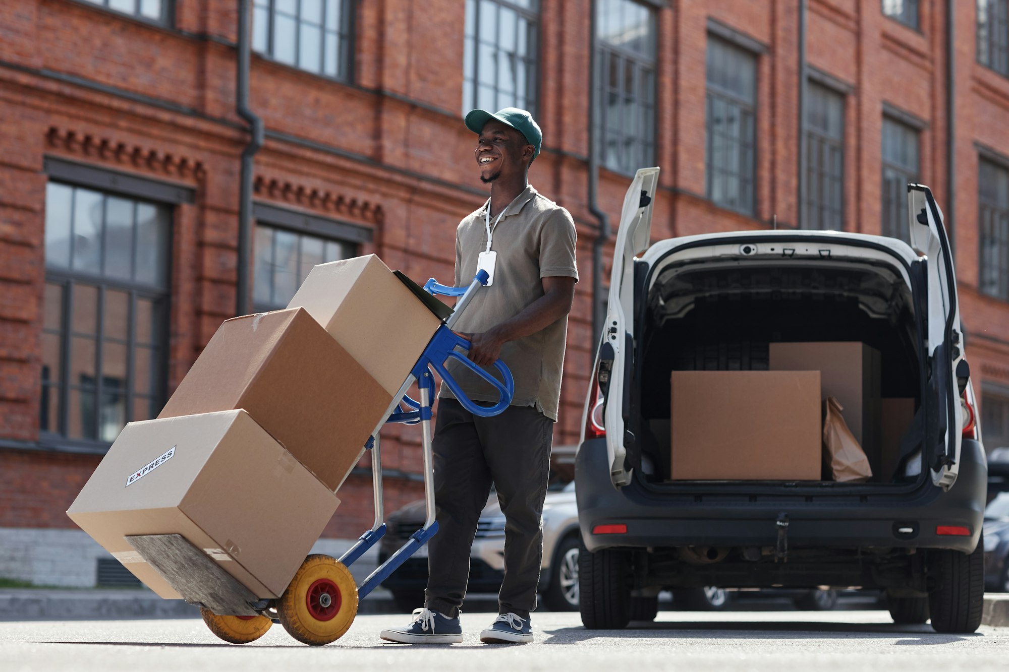 Delivery Worker Unloading Truck